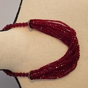 Necklace with ruby red sparkle beads.